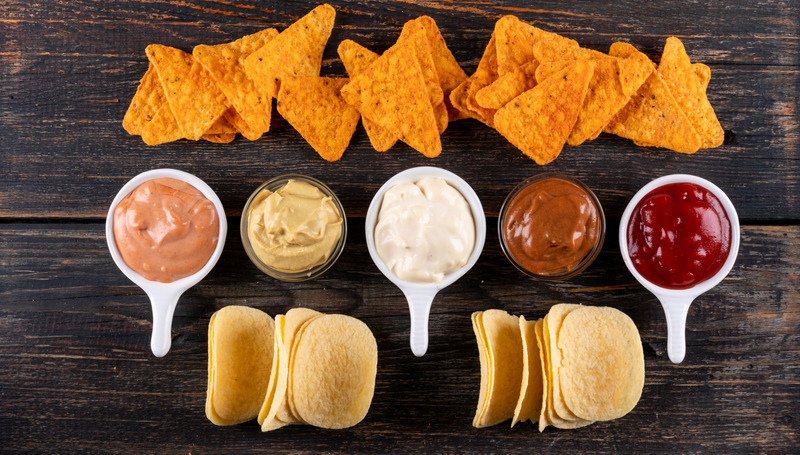 Afbeelding Grotere calorie-inname door dip bij zoute snack